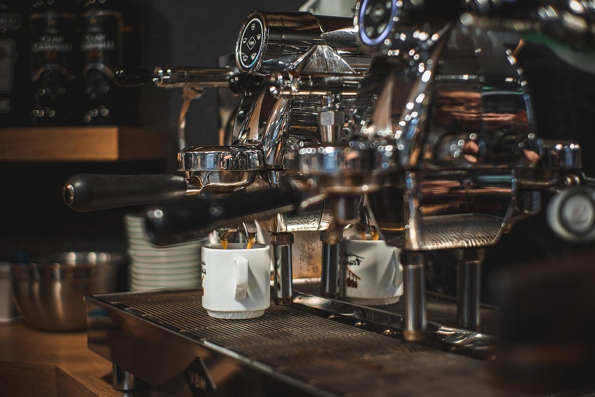 Espresso machine with cups in a coffee shop (Florida coffee shop insurance)