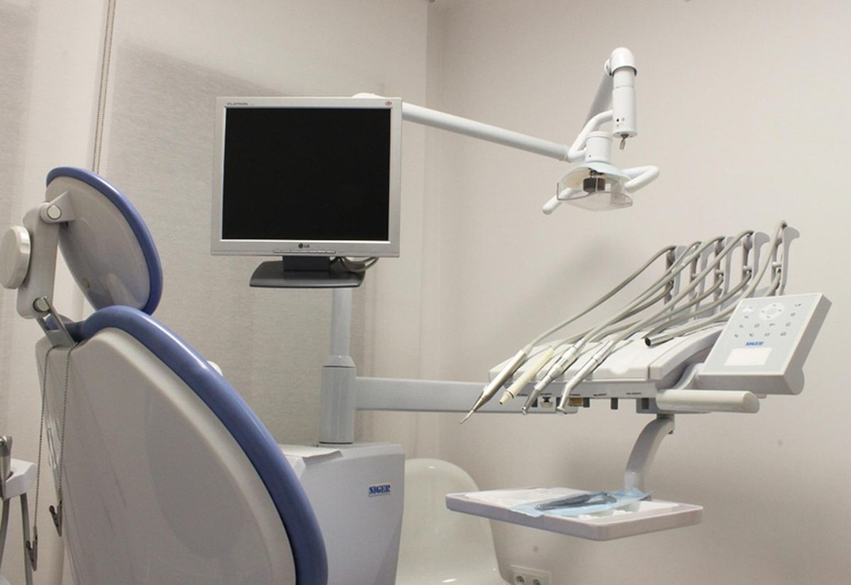 Dental chair and equipment in an empty dental office (Florida dental office insurance)